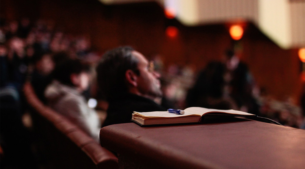 Notebook with pen at event 