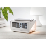 White alarm clock, wireless charging function for phones white colour ambient view