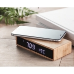 LED table clock with wireless phone charging, bamboo housing wood colour ambient view