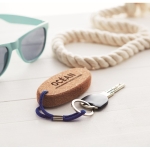Floating cork keyring, oval-shaped royal blue colour main ambient view