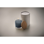 Vanilla scented branded candle in a glass for gifting photographic view