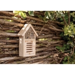 Small insect hotel made of wood, suitable for bees wood colour