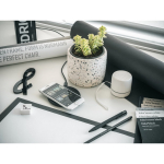 Wireless mobile phone charging pad, ultra slim still life view