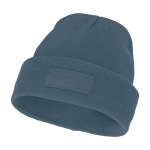 Cosy hat with patch cyan blue colour