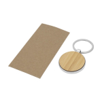 Round keyring made of zinc and bamboo wood colour second view