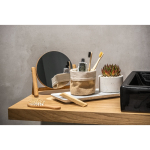 Natural bamboo comb with recycled kraft paper case included still life view