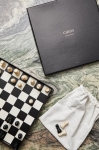 Classic chess set with black and white wooden pieces black colour