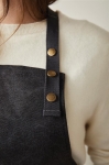 Recycled material apron with front pocket black colour