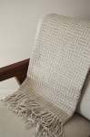 Geometric, patterned promotional blanket made of acrylic light brown colour