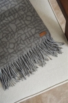 Geometric patterned throw with fringes, 130 × 170 cm grey colour