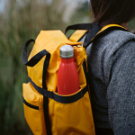Eco-friendly waterproof backpack with magnetic closure for 17” laptop dark yellow colour ambient view