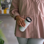 Double-wall recycled stainless steel travel mug 340ml white colour ambient view