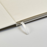 A5 hardback notebook made from recycled milk cartons with dotted pages white colour detail view