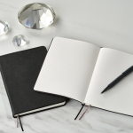 A5 hard-cover notebook in recycled faux leather with two pockets black colour ambient view