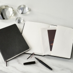 A5 notebook with flexible eco synthetic leather cover and dotted pages black colour ambient view
