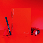 Reusable notebook with flexible cover and marker, A5, plain pages red colour still life view