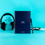 Reusable A5 hardback notebook with InfiniteBook scan black ink navy-blue colour still life view