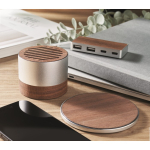 Wireless speaker made from recycled aluminium with walnut details wood colour ambient view