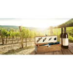 Wine set in elegant bamboo and metal box still life view