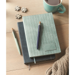 Softcover notebook, smoked synthetic leather, A5, ruled pages mint green colour ambient view