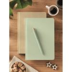 Hardcover notebook, sugarcane paper, A5, ruled pages mint green colour ambient view