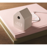 Small birdhouse-shaped desk clock, with alarm white colour ambient view