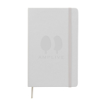 Moleskine large-format notebook with elastic closure, ruled pages white colour close-up view with logo