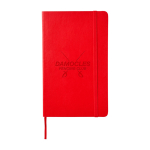 Moleskine Classic lined notebook with ”in case of loss” note dark red colour close-up view with logo