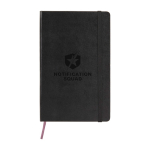 Large Moleskine Classic leather-look paper notebook squared pages black colour close-up view with logo