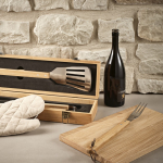 Barbecue set in bamboo box with grill utensils natural colour ambient view
