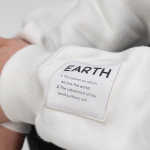 Unisex organic cotton 1/4 zip sweatshirt 340g/m² Malibu white colour detail view