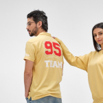 Unisex organic cotton short-sleeve polo 160g/m² Ipanema yellow colour ambient view