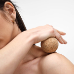 Compact cork ball for stretching and muscle relief natural colour ambient view