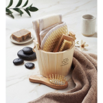 Bath set in a wooden bucket with body care accessories wood colour main ambient view
