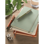 A5 recycled faux leather hard cover notebook, lined pages mint green colour ambient view
