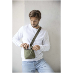 Lightweight crossbody bag with adjustable strap and padding black colour lifestyle image