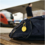 Water-resistant BT tracker with Chipolo sound alarm yellow colour lifestyle image
