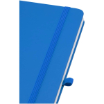 A5 hard cover synthetic leather notebook with ruled pages light blue colour close-up view 1