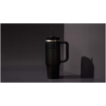 Stanley 890 ml insulated tumbler with rotating lid and reusable straw black colour lifestyle image 2