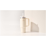 Stanley 890 ml insulated tumbler with rotating lid and reusable straw beige colour lifestyle image 2