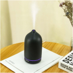 Prixton humidifier with 7-colour LED light and timer black colour lifestyle image