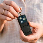 Compact personal alarm rechargeable via USB-C with LED light 150 dB black colour ambient view