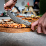 Boska stainless steel double-grip pizza and cheese knife silver colour ambient view