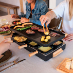Table raclette with reversible non-stick plate Boska black colour ambient view 2