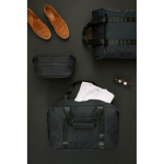 Lightweight eco travel bag with zip and 36.5L capacity green colour ambient view