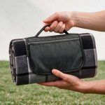 Foldable recycled polyester picnic blanket with waterproof backing grey colour ambient view