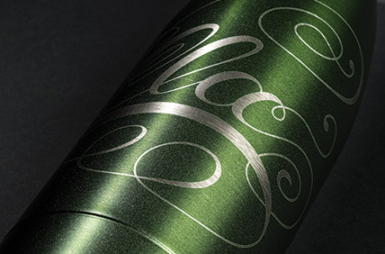 Circular laser engraving with permanent, wrap-around marking