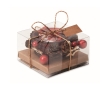 Glass candle holder with Christmas decorations colour red