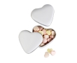 Small heart-shaped metal tin with heart-shaped sweets colour white