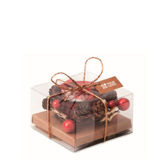 Glass candle holder with Christmas decorations